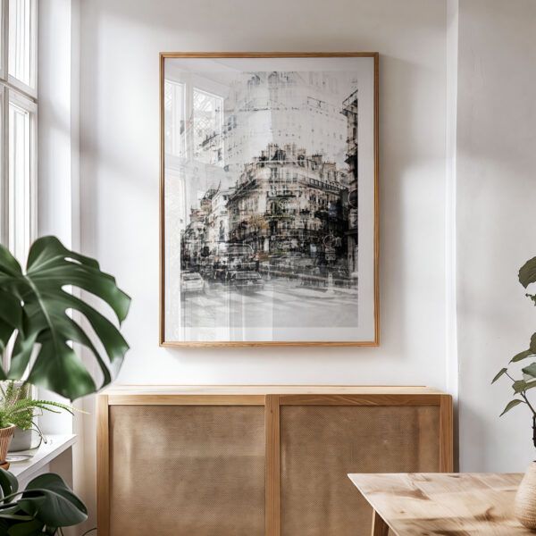 Paris cityscape double exposure print in minimalist wood frame, displayed in a sunlit modern interior with neutral decor.