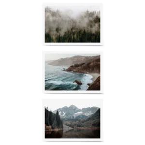 Trio of landscape prints featuring a foggy evergreen forest, a rugged coastal shoreline with ocean waves, and snow-dusted mountain peaks reflected in a calm lake.