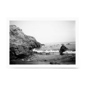 Unframed fine art photography print of rocky cliffs and ocean waves along the Pacific coastline, shown on a white background.