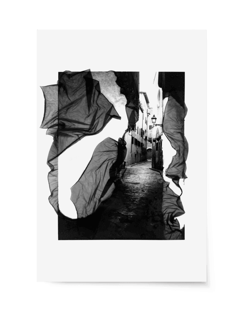 Black and White photography of an Italian alley intervened with Mordançage.